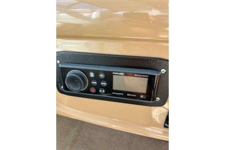Control panel of a 2004 Carver 466 Motor Yacht with Fusion MS-RA70NSX stereo system. Control panel of a 2004 Carver 466 Motor Yacht with Fusion MS-RA70NSX stereo system.
