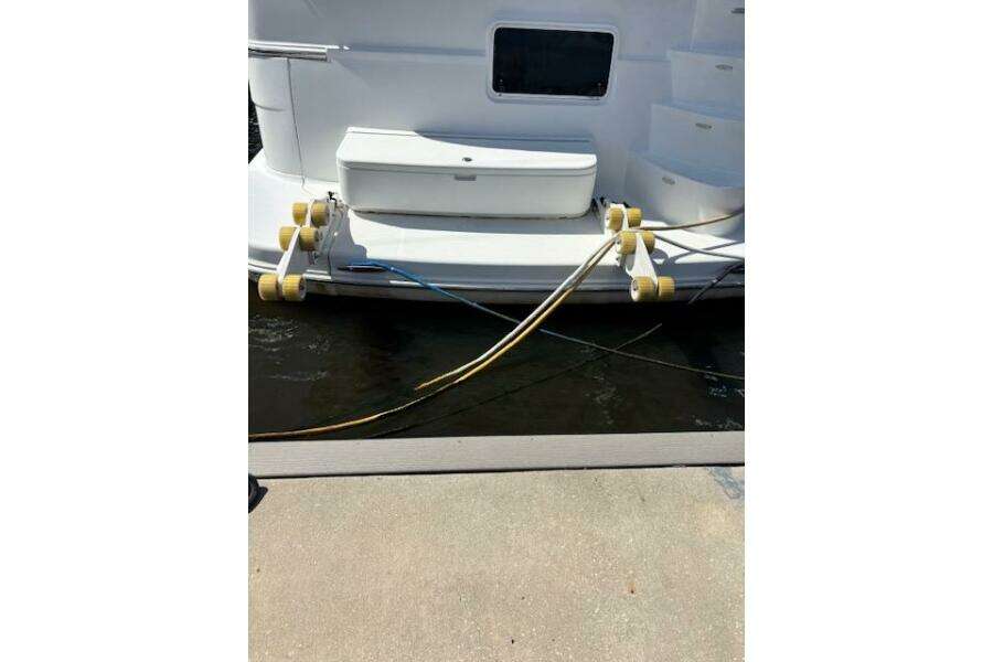 2004 Carver 466 Motor Yacht docked with mooring lines and fenders. 2004 Carver 466 Motor Yacht docked with mooring lines and fenders.