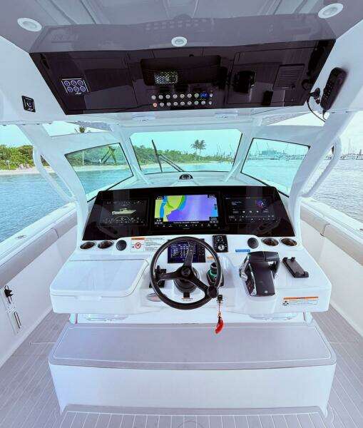 2024 Scout 400 LXF boat helm with advanced navigation displays and controls.