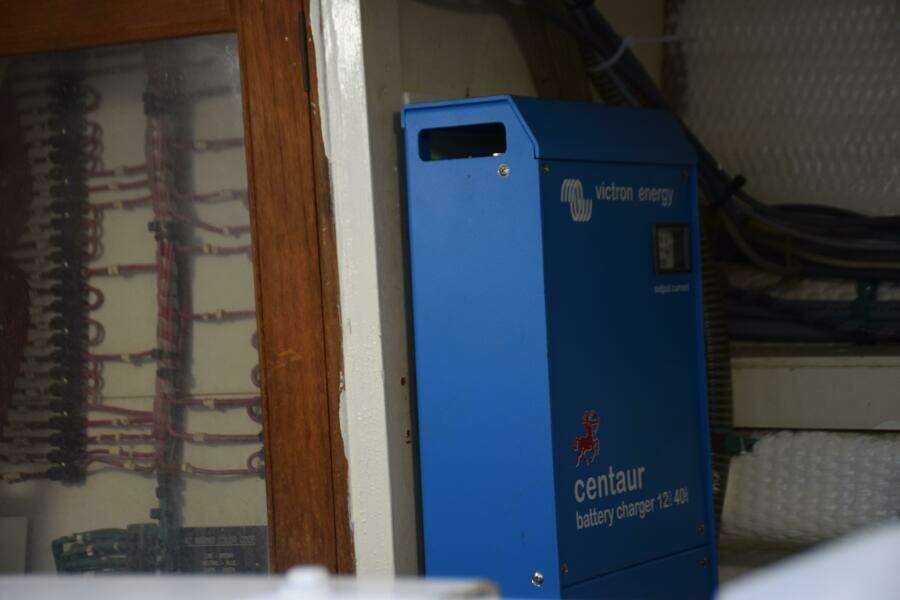 Blue Victron Energy Centaur Battery Charger On A 1997 Grand Banks Classic Boat.