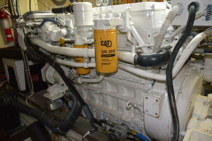 Engine Room Of A 1997 Grand Banks Classic With A CAT Engine Filter.