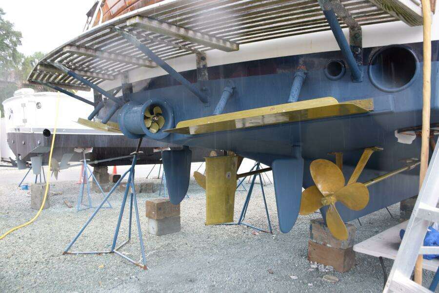 1997 Grand Banks Classic Yacht Underbody With Propellers And Supports In Dry Dock.