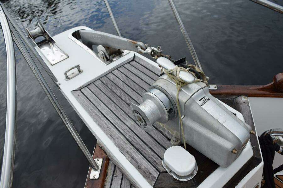 1997 Grand Banks Classic Yacht Deck With Anchor Winch And Wooden Details.