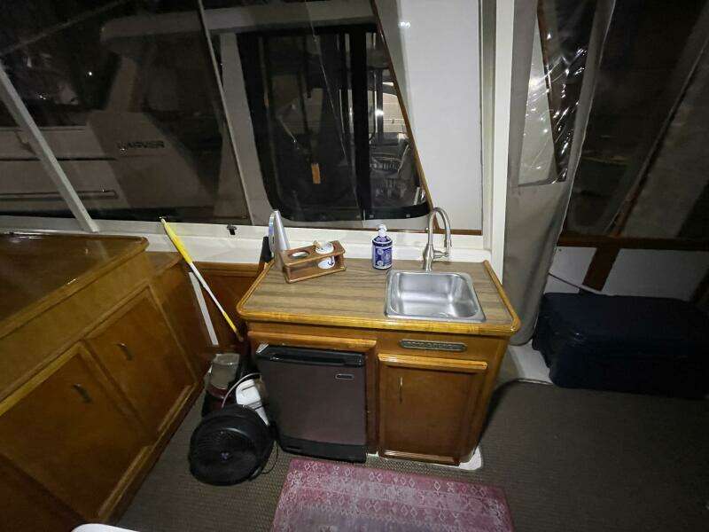 Wet Bar with Sink and Mini Fridge – Egg Harbor 40 Motor Yacht