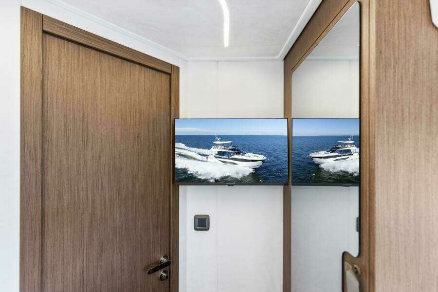 2026 Prestige F5.7 Flybridge - Guest Suite TV