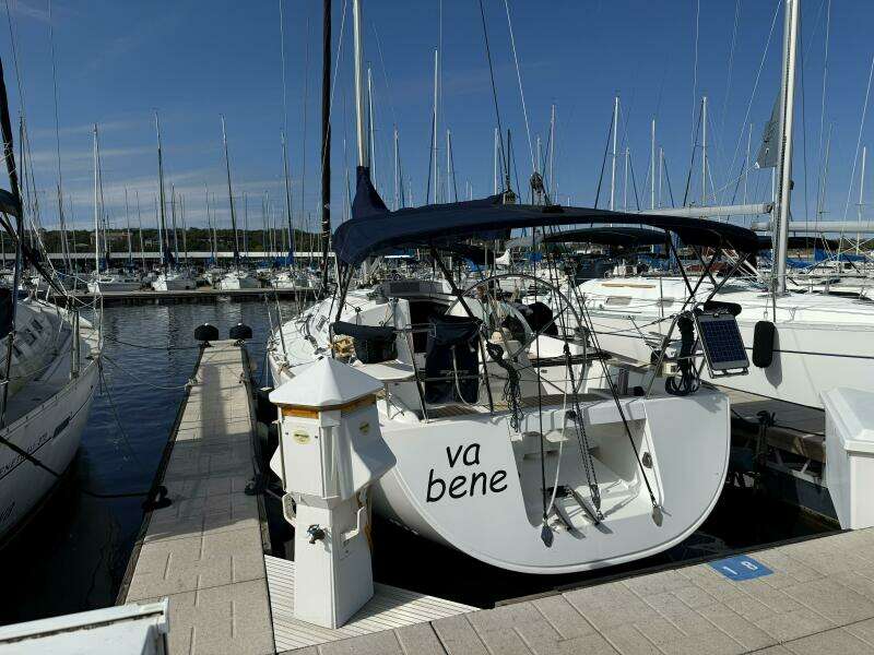 Stern with telescoping swim ladder