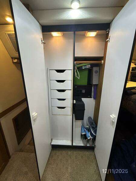 47' Bayliner port forward stateroom locker