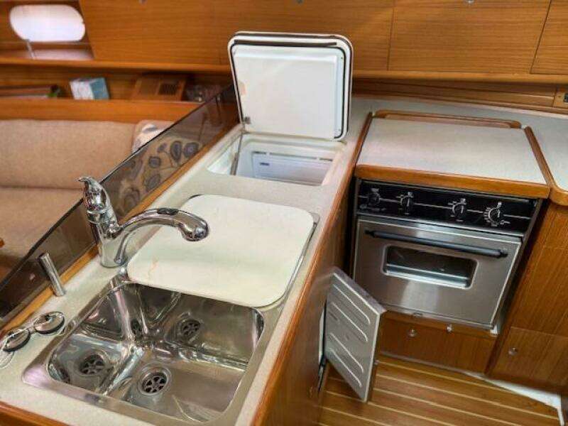 Galley with top and bottom fridge/freezer doors open