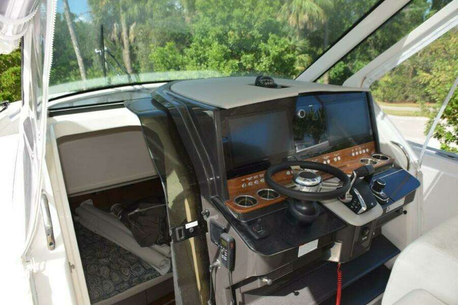 Helm With Dual Garmin 8616 Nav Screens, Bow Thruster, Fusion Stereo. RGB Lighting Control