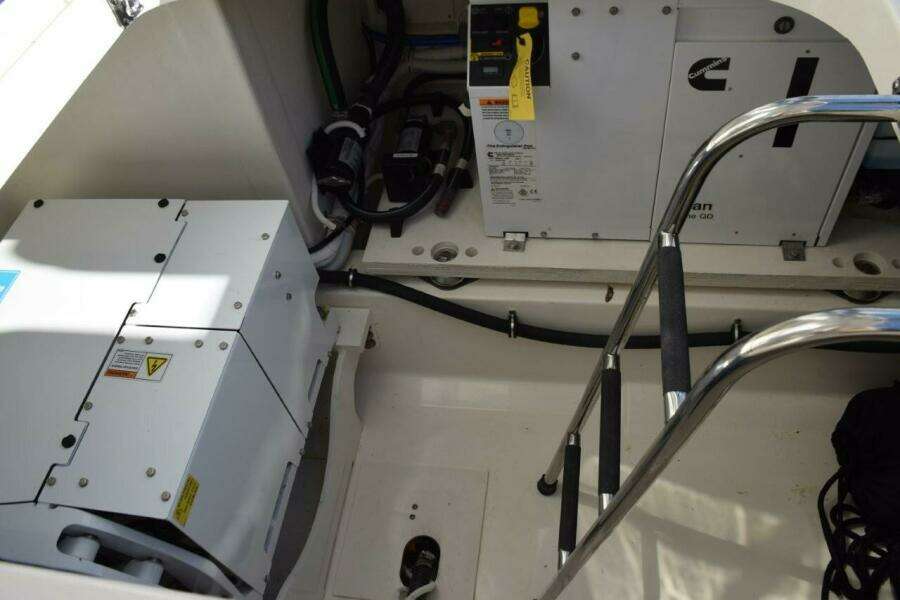 Engine Compartment Of 2024 Tiara Yachts 38 LS With CumminsOnan Diesel Generator And SeaKeeper Gyro Stabilizer
