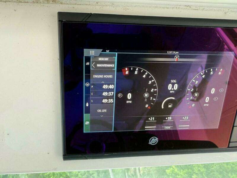 Dashboard Display Of 2024 Tiara Yachts 38 LS Showing Engine Hours And RPM Gauges