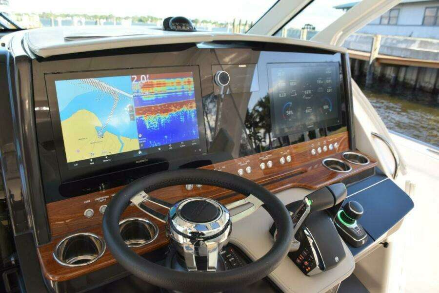 Helm With Tiltable Wheel, Wood Dash Panel With Drink Holders, Glovebox To The Right