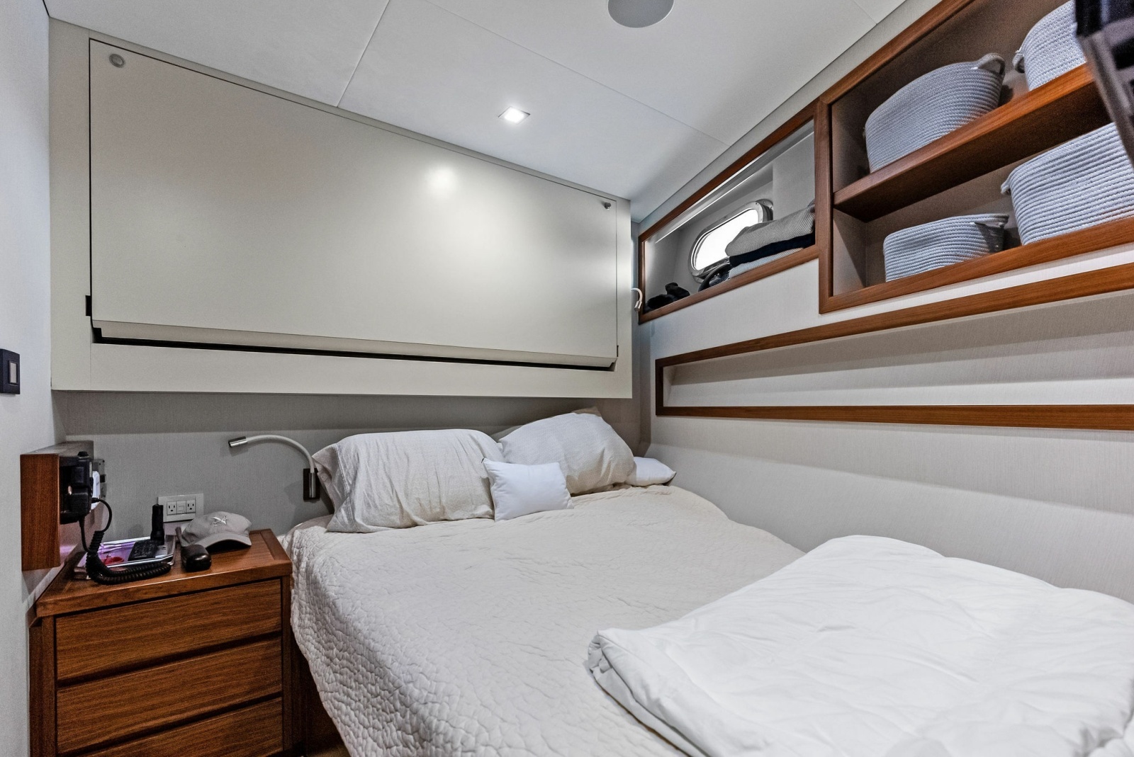 Crew cabin #2, portside with overhead pullman berth