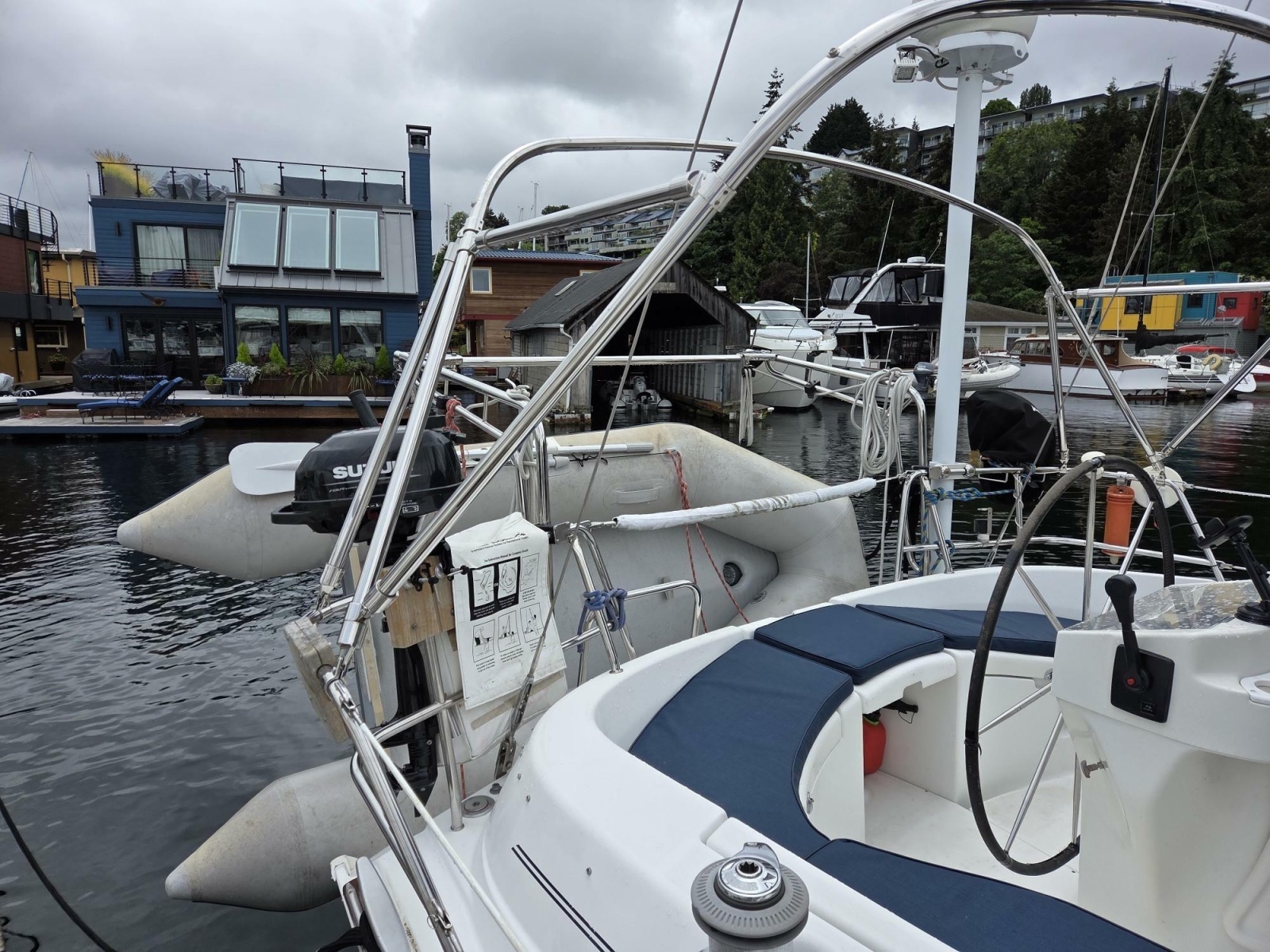 Beneteau Oceanis 411 sailboat docked at Signature showing davits and dinghy