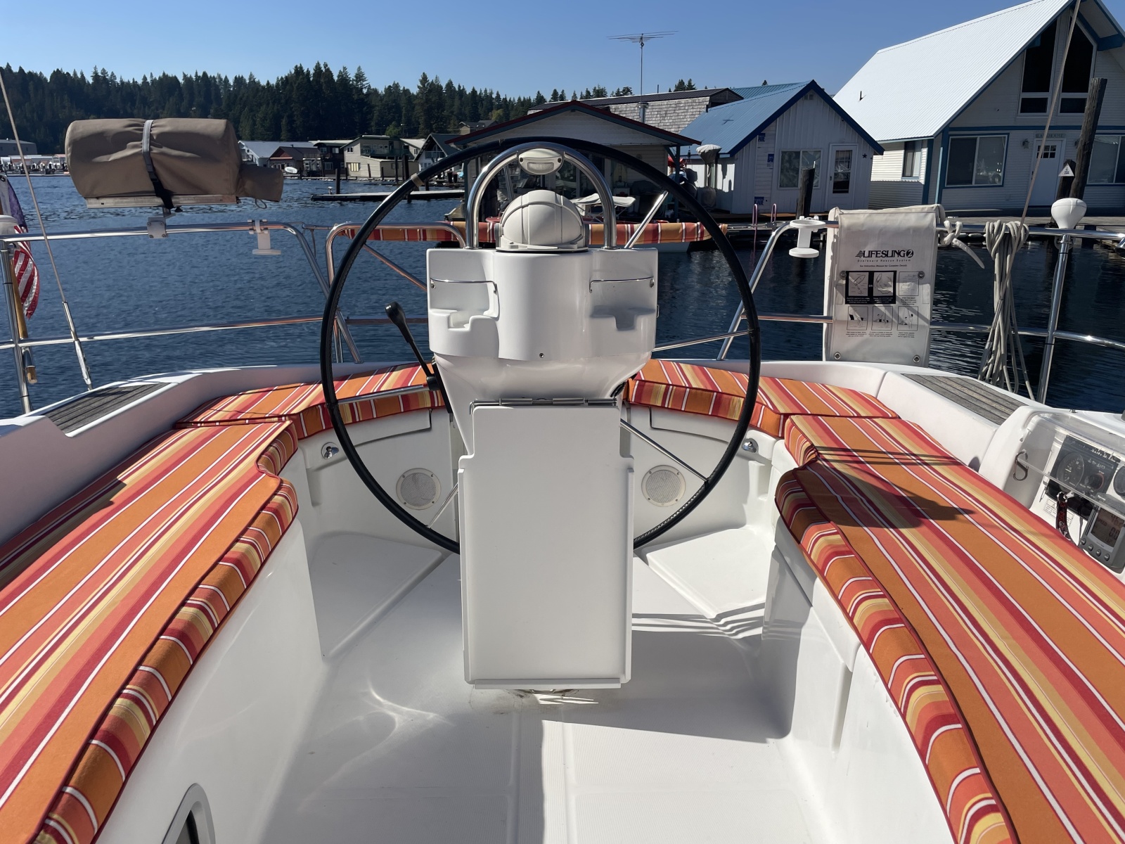 Cockpit of 2007 Beneteau 393 sailboat with striped seating