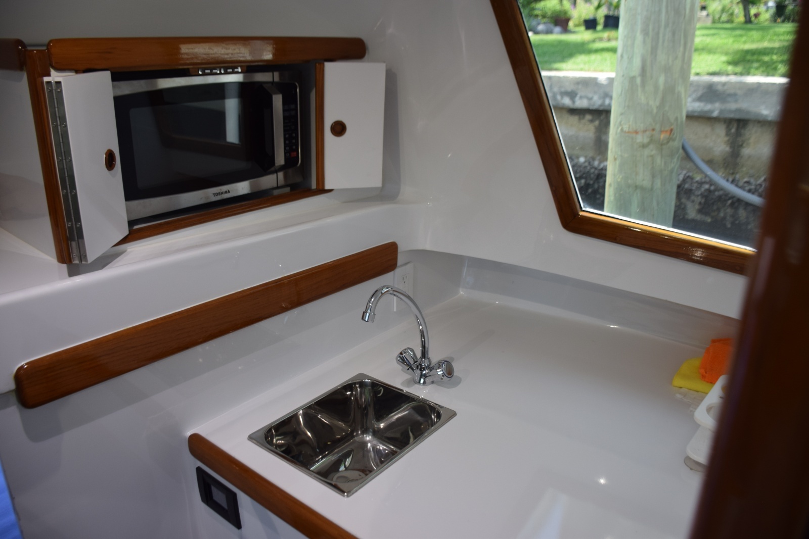 Microwave And Stainless Sink