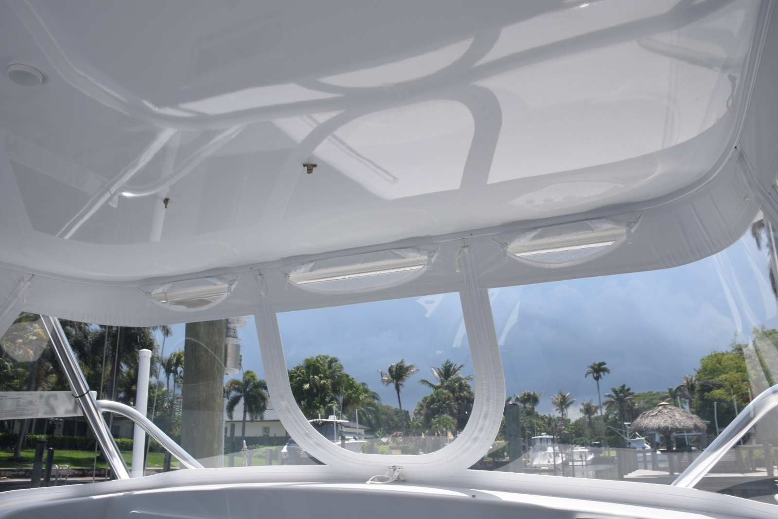Enclosure With Screened Vent Openings And Center U Zip Panel Can Be Pinned Open Onto Hardtop