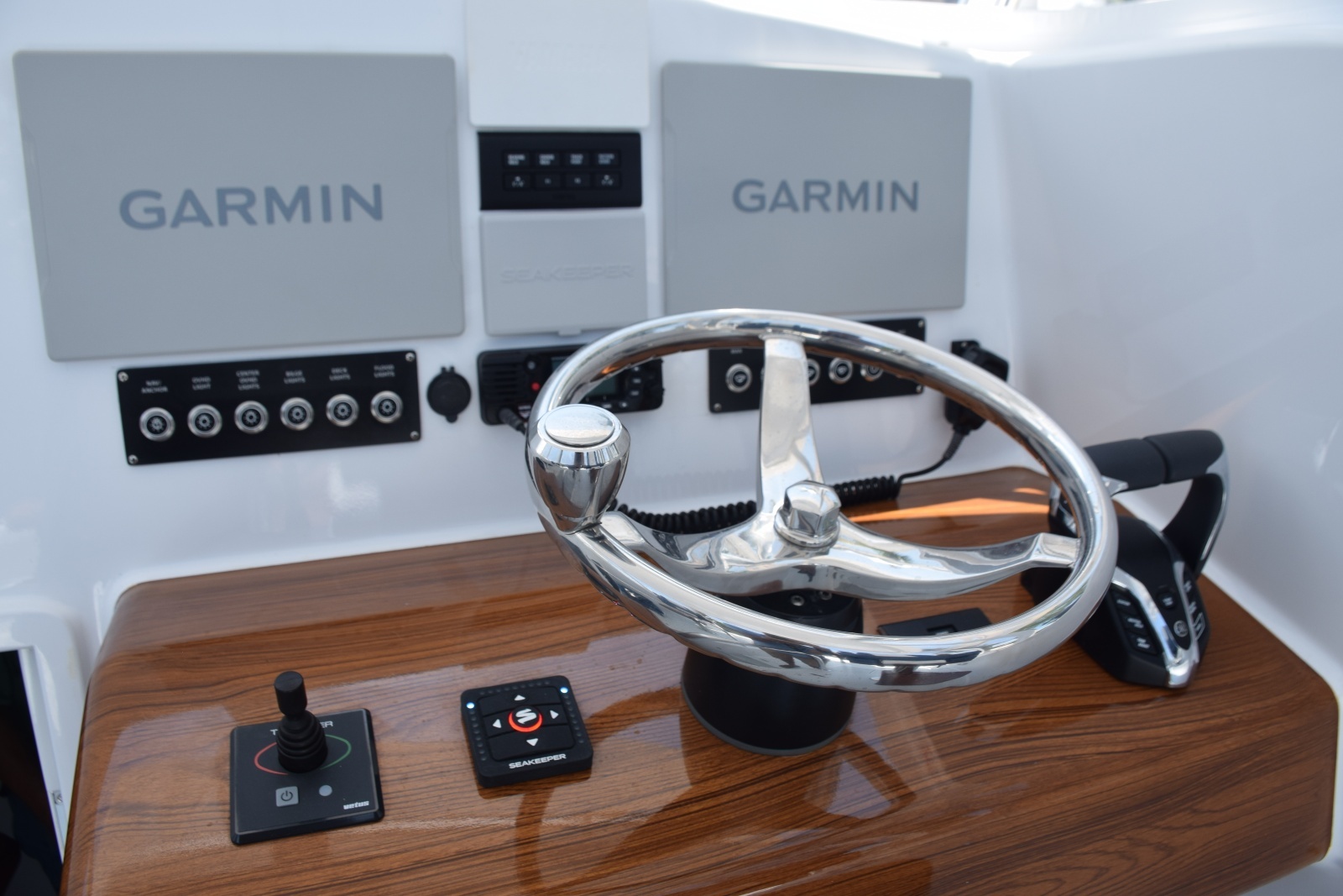 Helm Has Garmin Screens, Gyro Control Panel, Vhf, Thruster Jogstick, Seakeeper Ride Panel