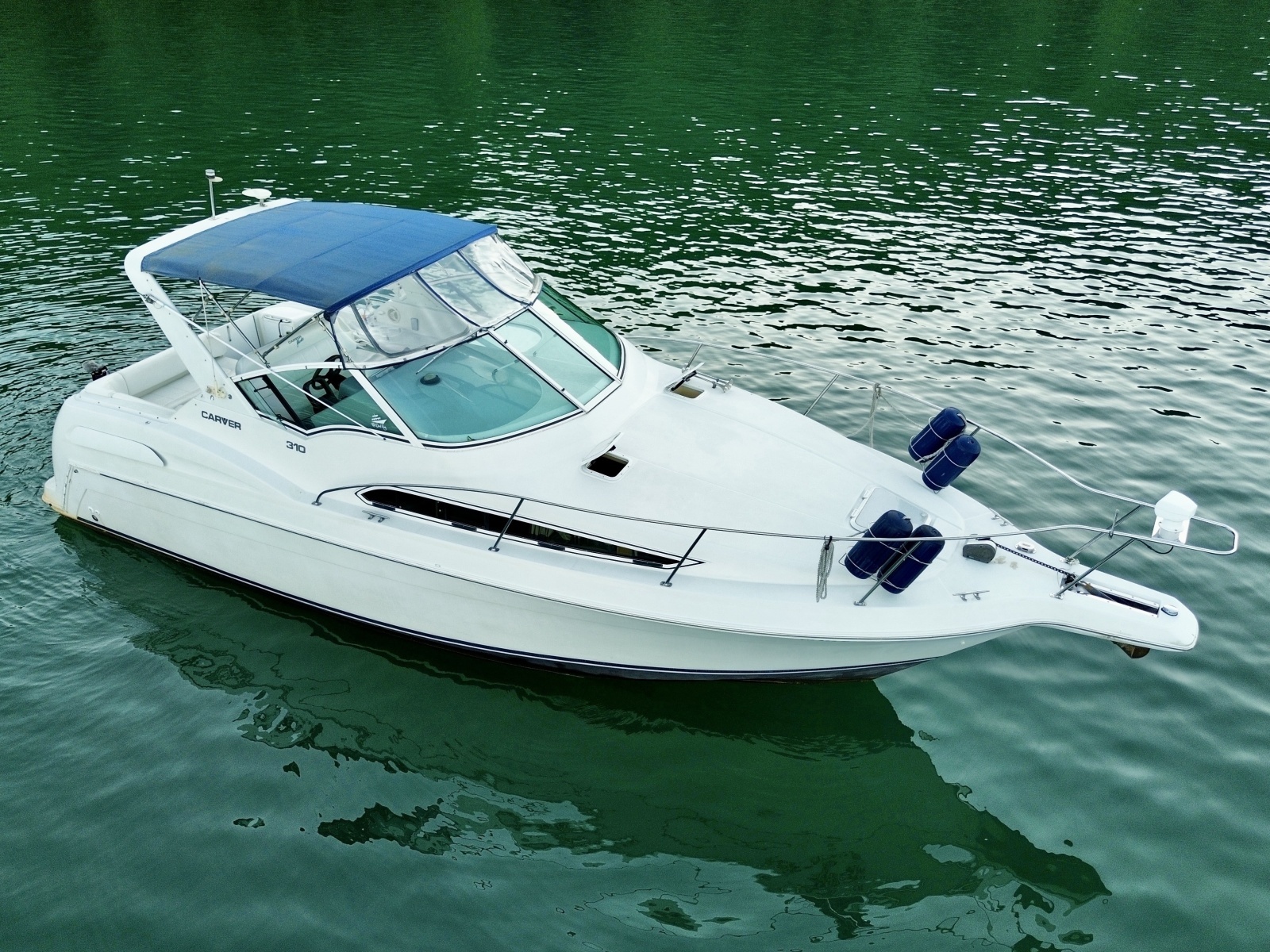 1996 Carver 310 Mid Cabin Express