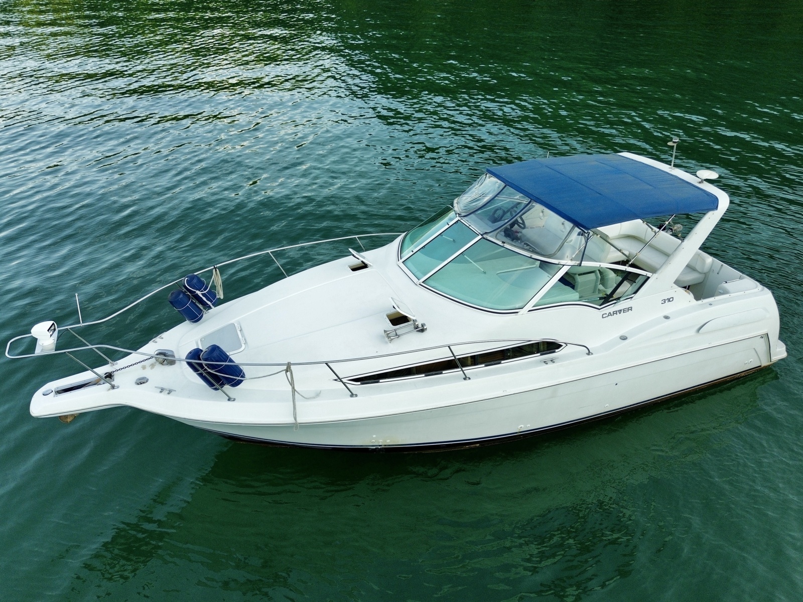 1996 Carver 310 Mid Cabin Express