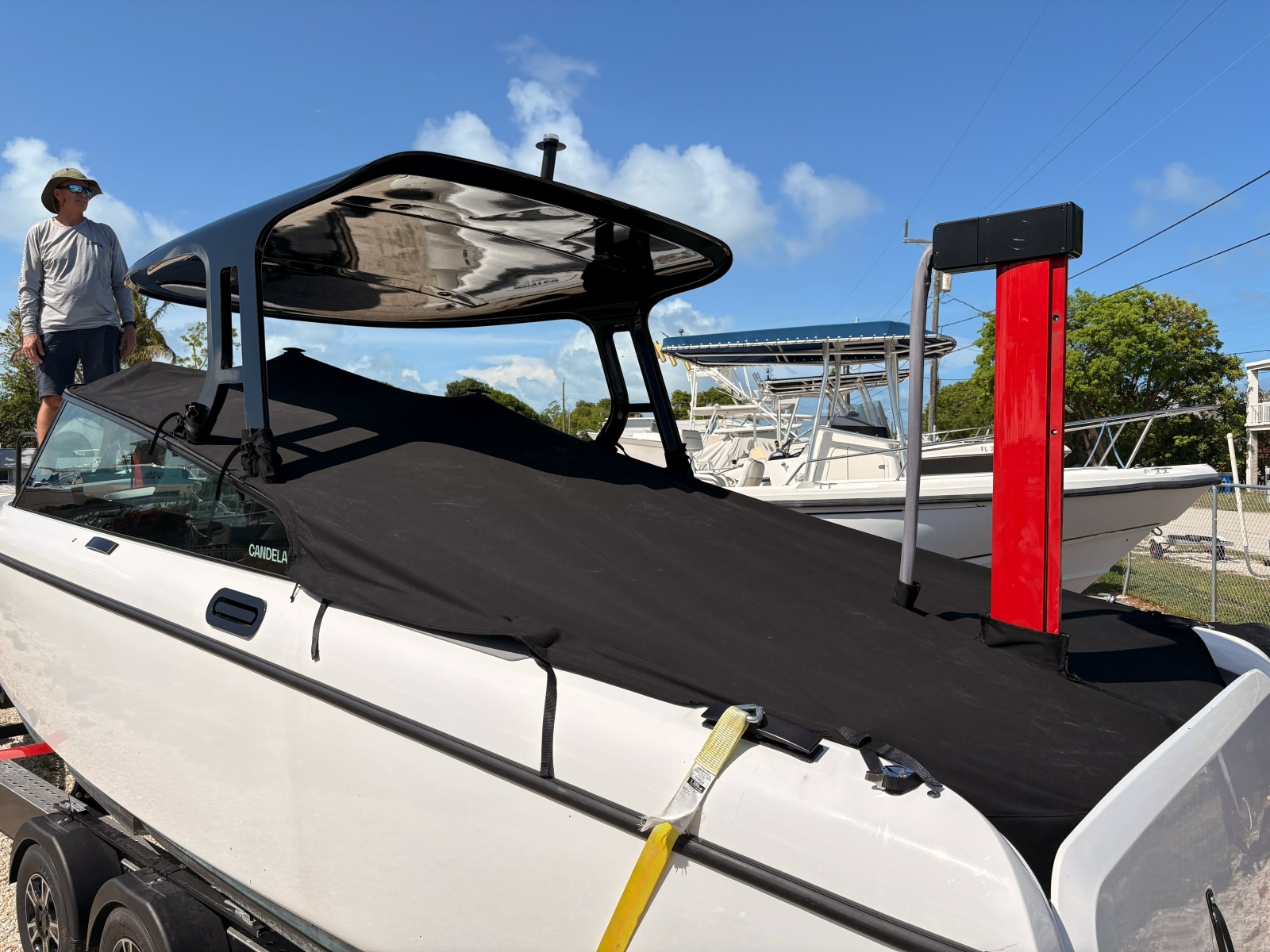 Candela C-8 on trailer with cover