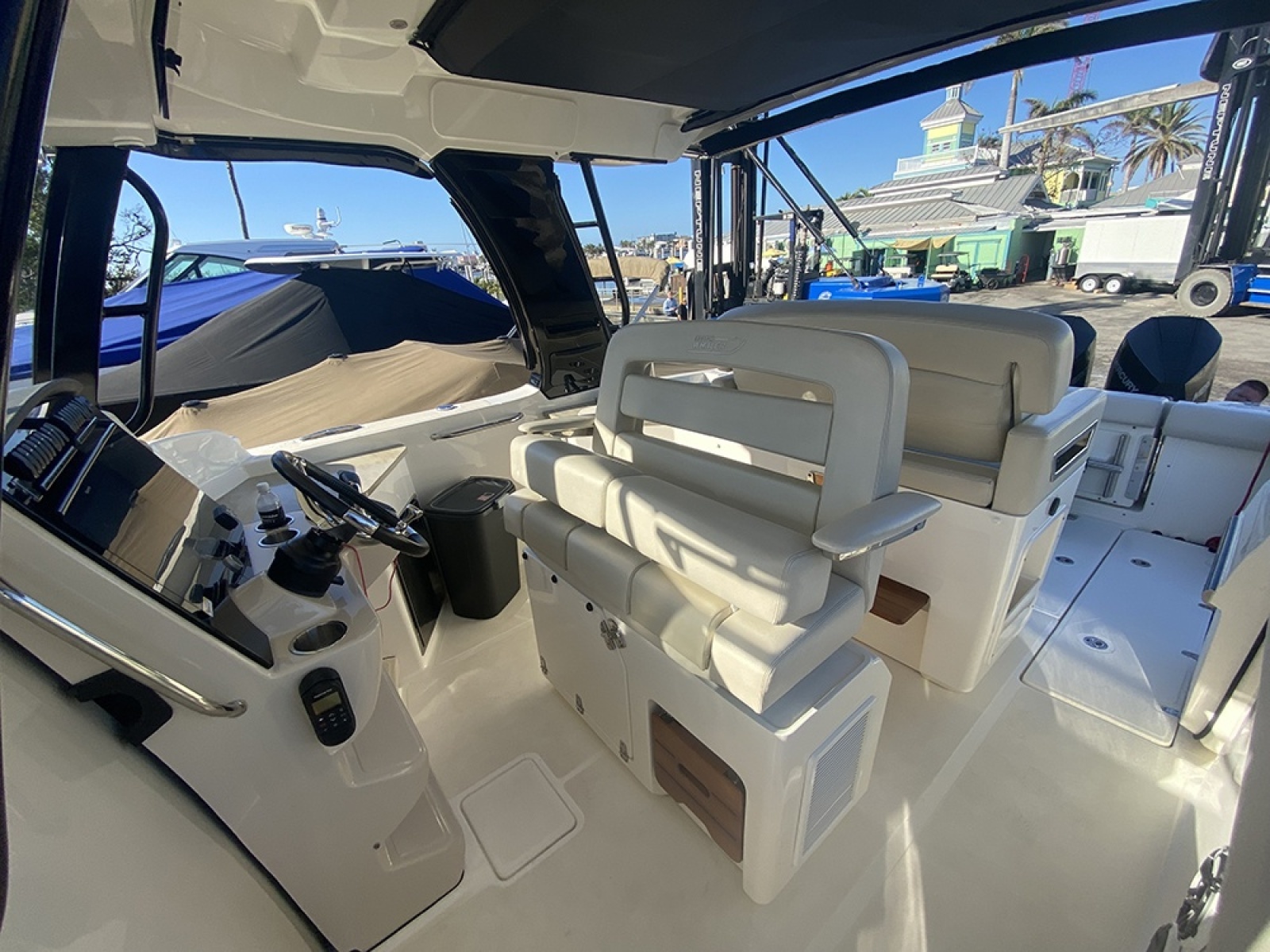 2023 Boston Whaler 350 Realm interior with helm and seating area.