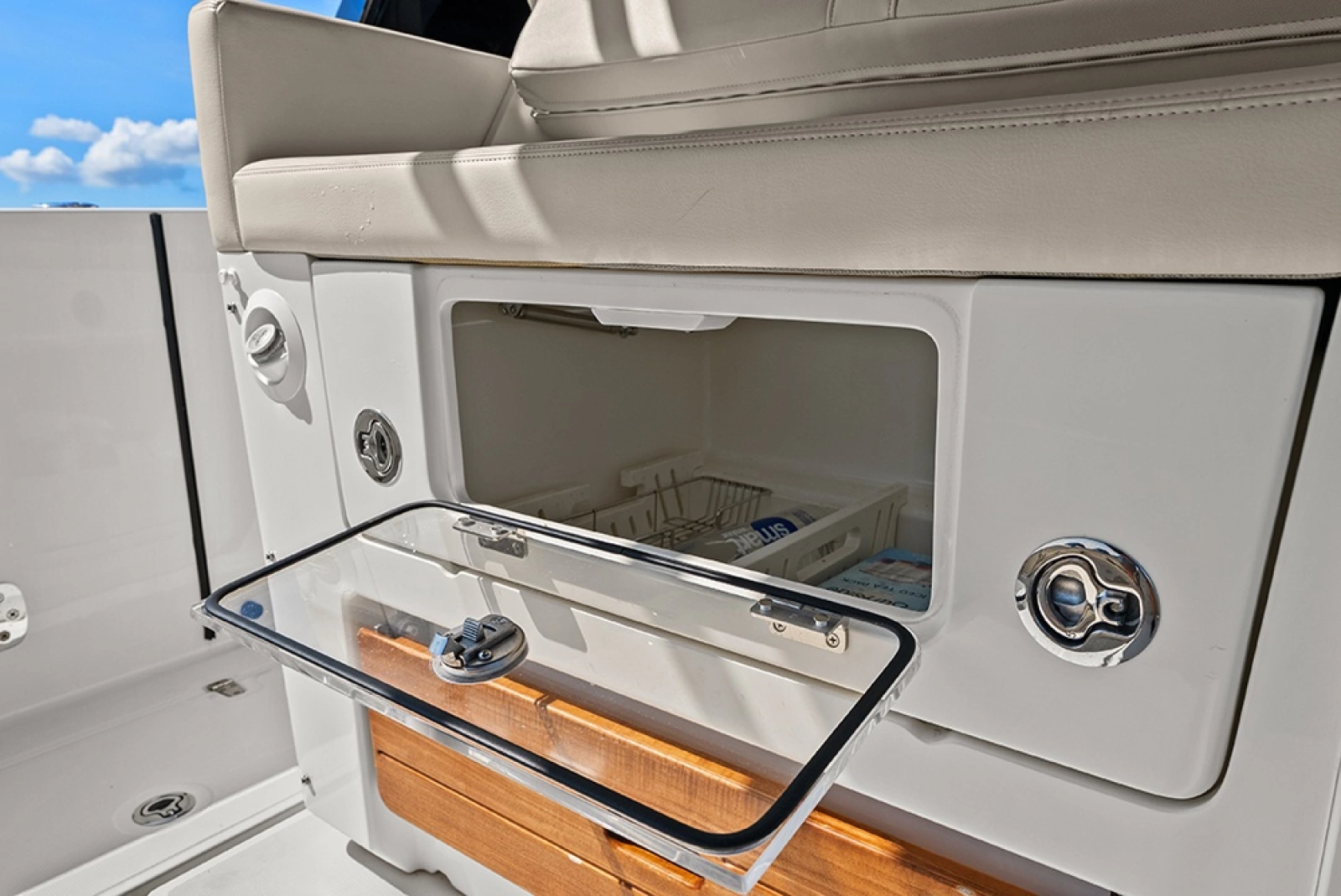 Insulated built-in cooler/storage under second row seating