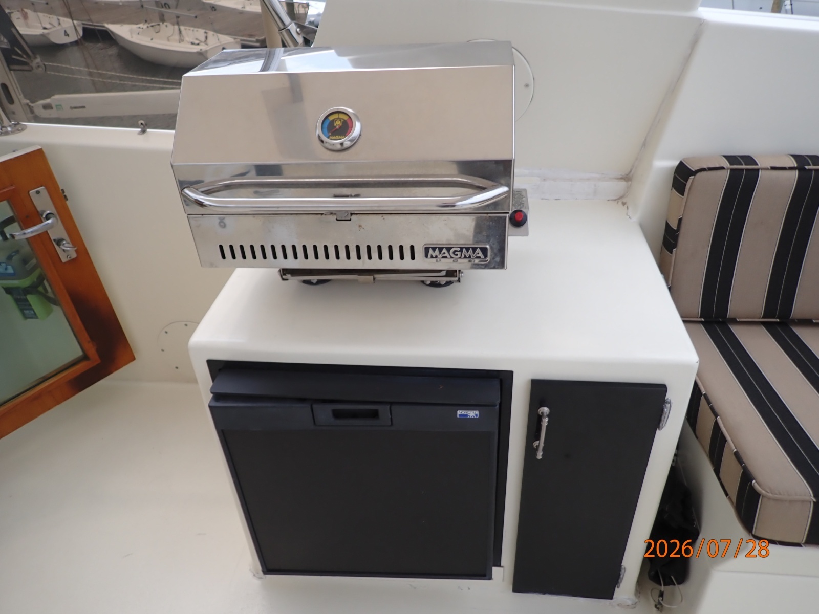 54' Hatteras flybridge starboard cabinet-frig-grill