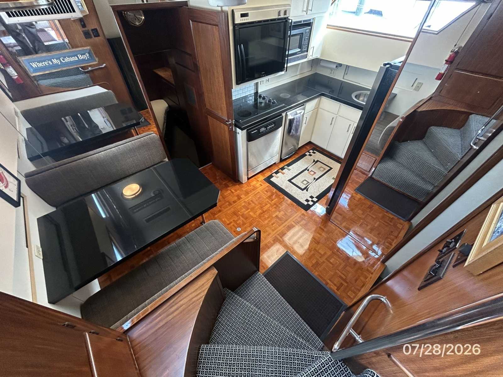 54' Hatteras galley-dinette forward