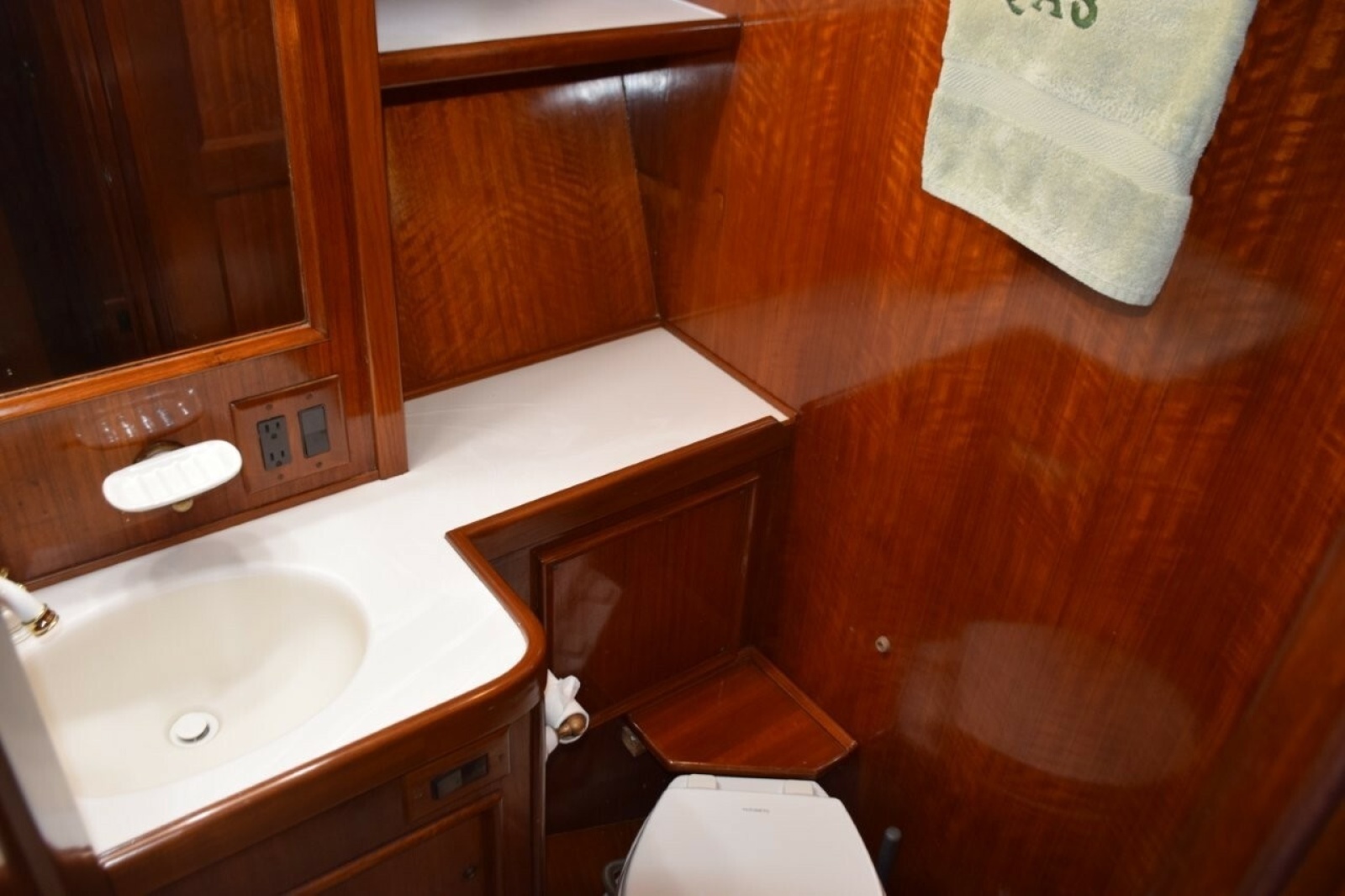 Guest Head Also Has Second Door From Companionway.  Molded Vanity Top And New Freshwater Head