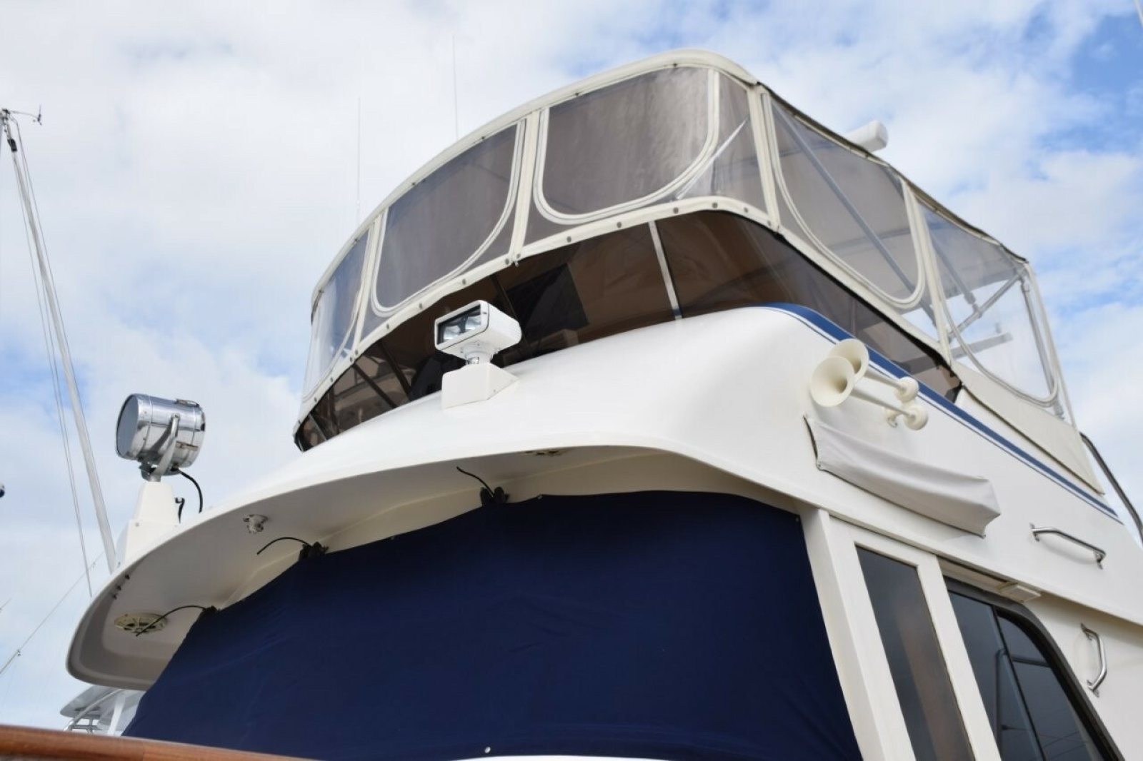 Navy Sunbrella Canvas Windshield Mask, Name Board Covers, And 3 Sided Flybridge Enclosure With U Zips