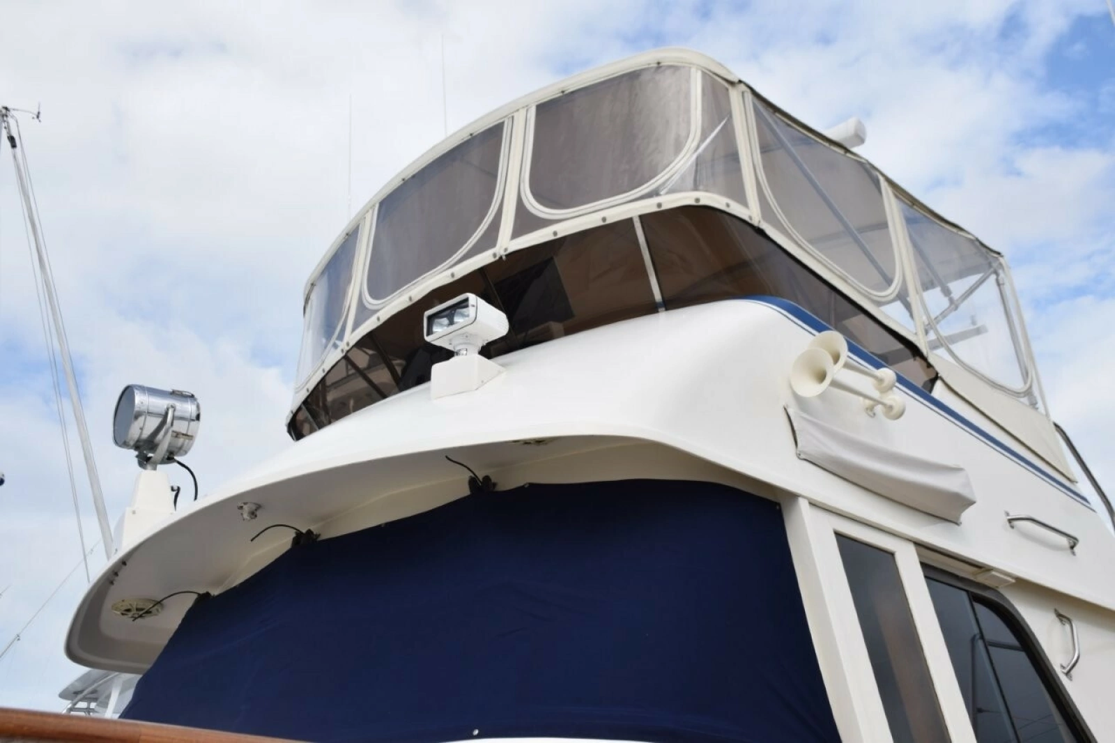 Navy Sunbrella Canvas Windshield Mask, Name Board Covers, And 3 Sided Flybridge Enclosure With U Zips