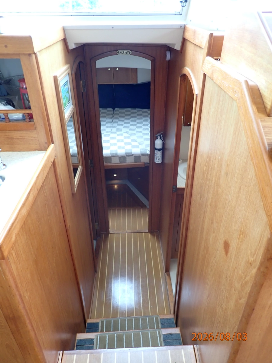 43' Mainship guest stateroom companionway forward