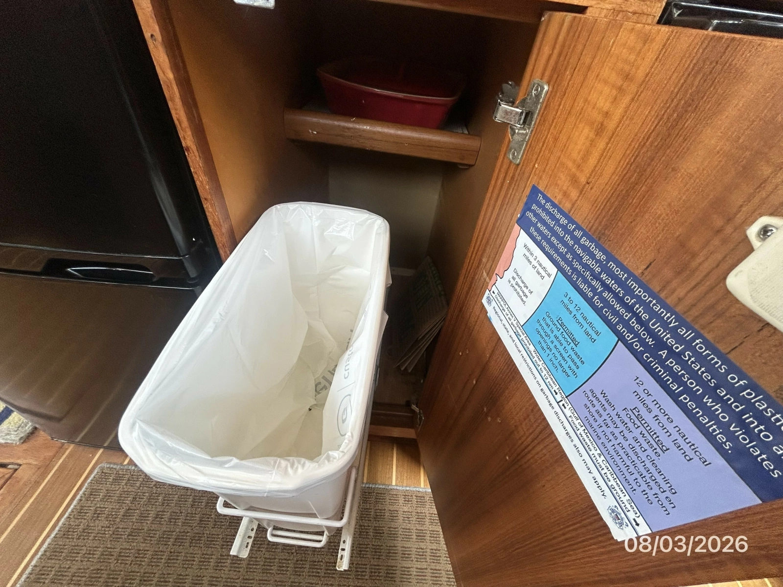 43' Mainship galley trash compartment