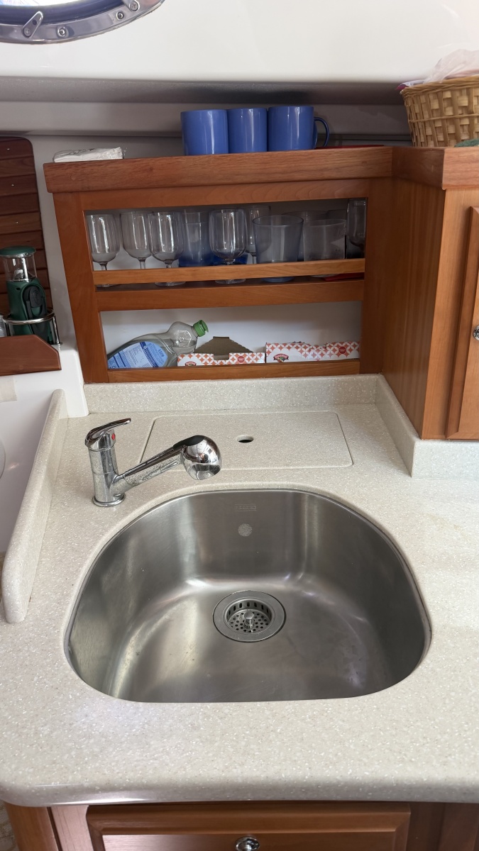 Liberty galley sink w/outboard trash bin and shelves