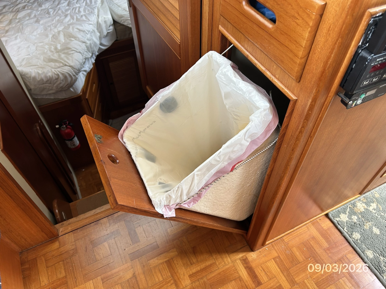 42' Grand Banks galley trash compartment