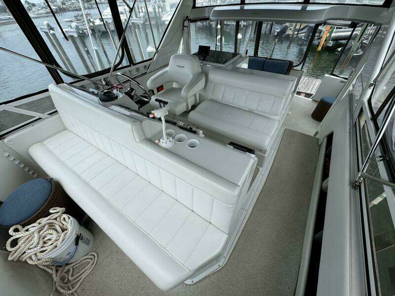 23 1999 Carver 406 Helm Looking Aft