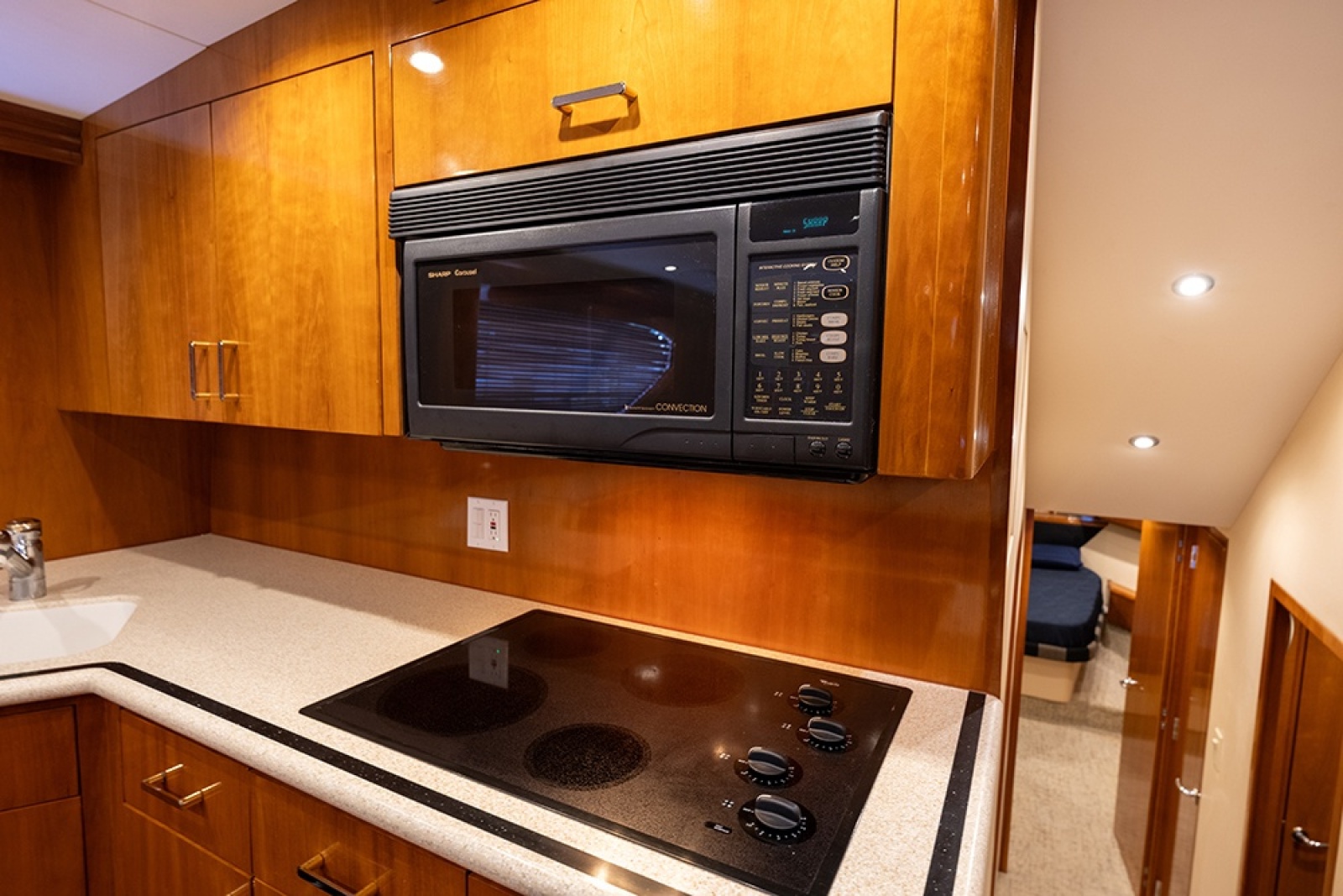 Microwave/convection oven and 4-burner surface cooktop