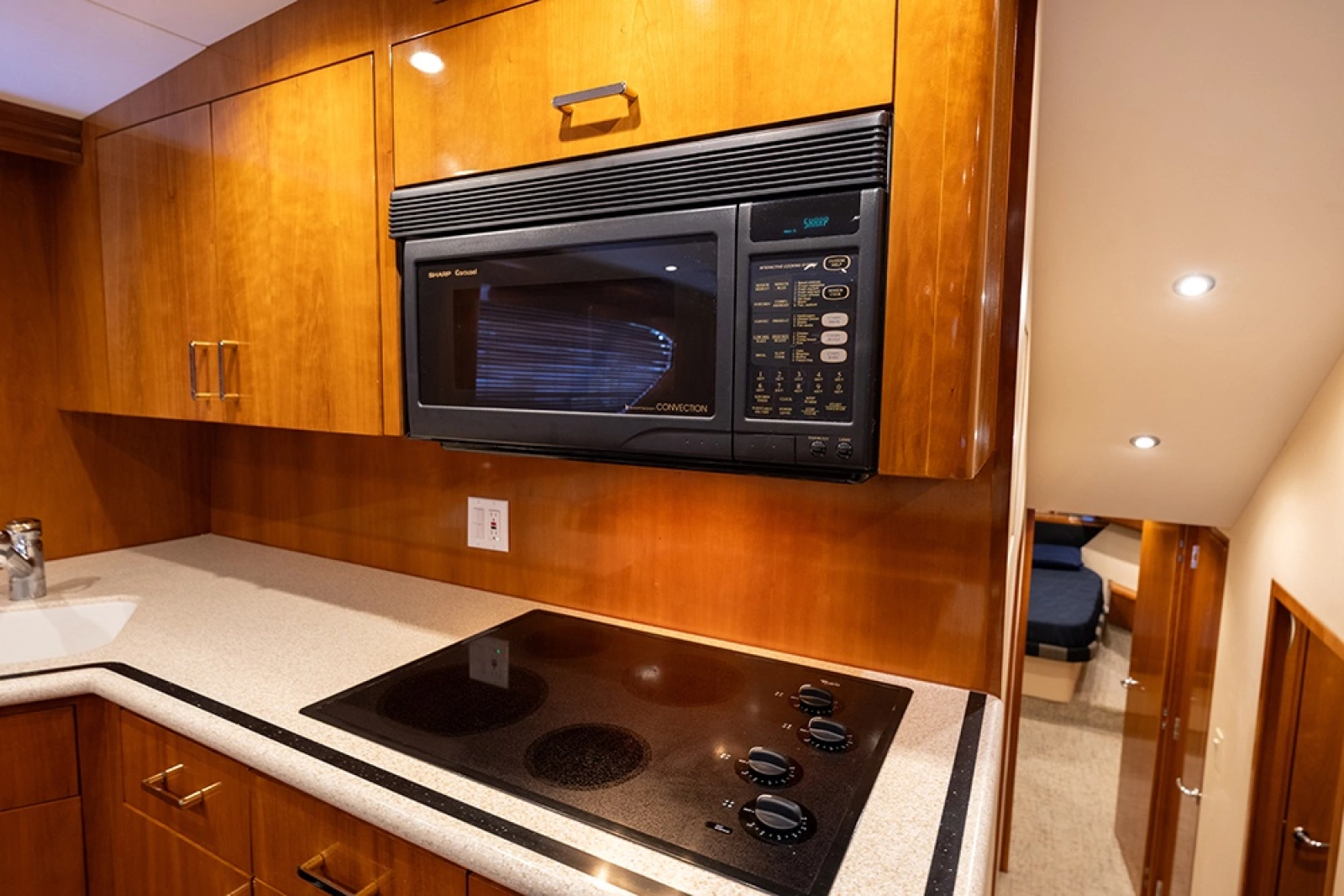 Microwave/convection oven and 4-burner surface cooktop