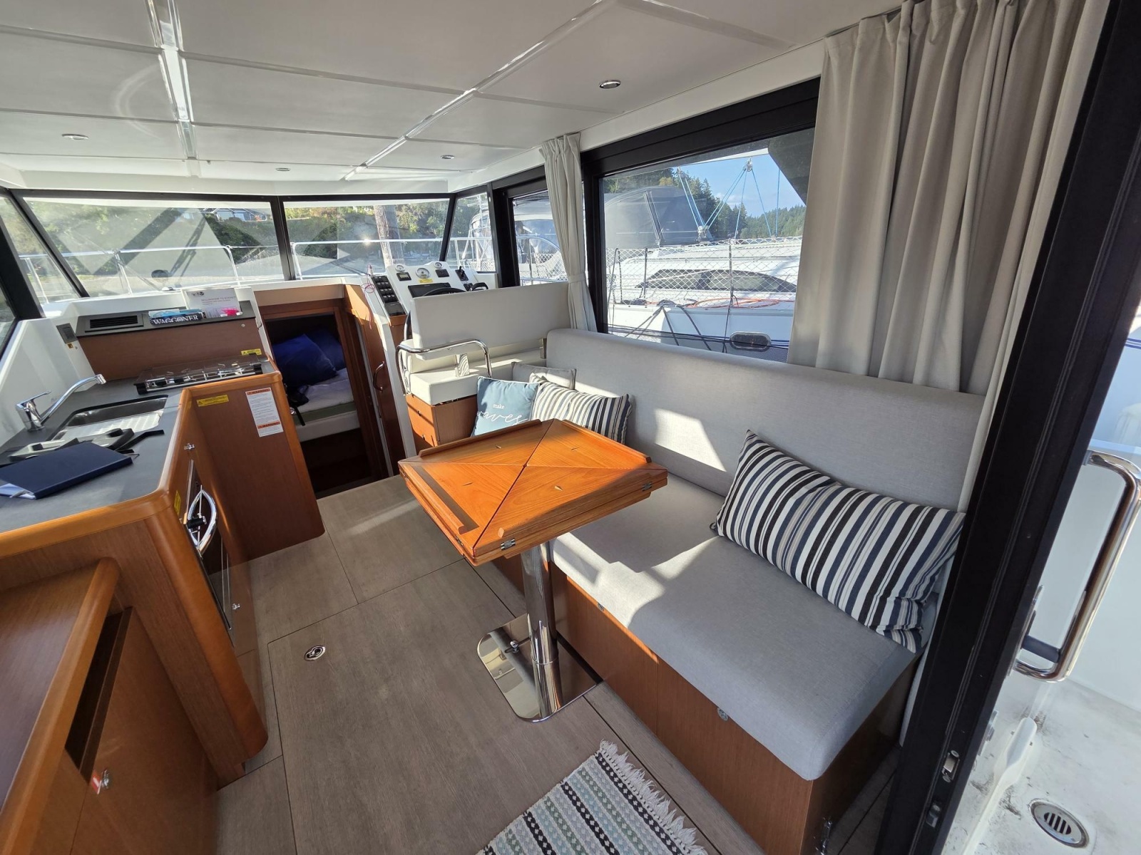 Spacious salon, galley, and helm station