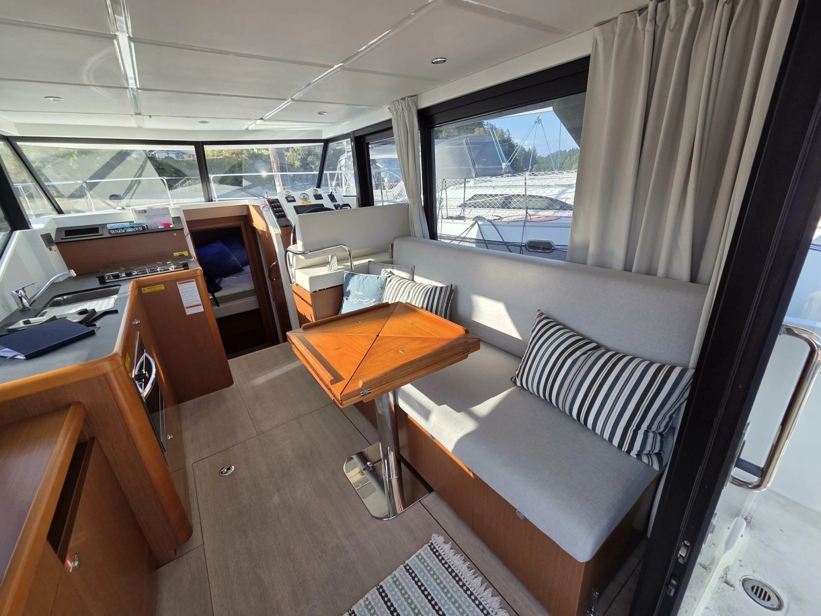 Spacious salon, galley, and helm station