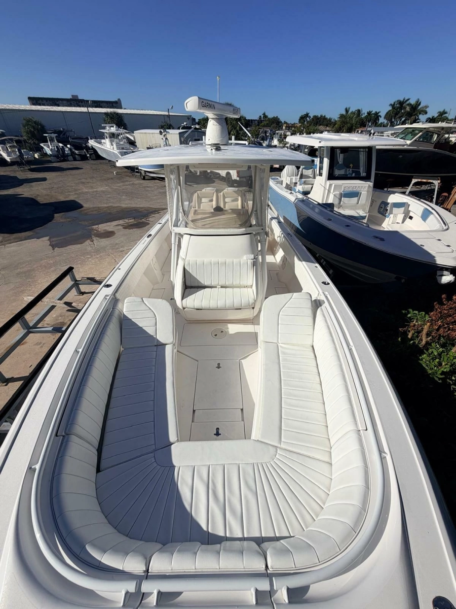 2017 Intrepid 327 Center Console for sale in Pompano Beach FL - bow-to-stern view of the cockpit and forward seating
