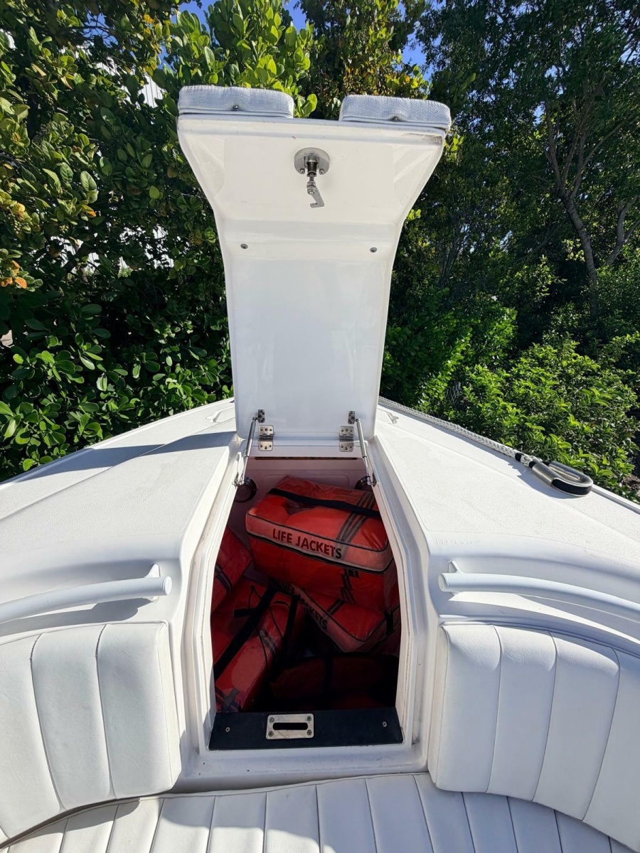2017 Intrepid 327 Center Console for sale in Pompano Beach FL - open bow locker with life jackets and stowed gear