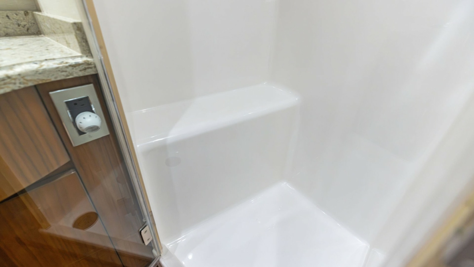 Enclosed Shower with Granite Accents