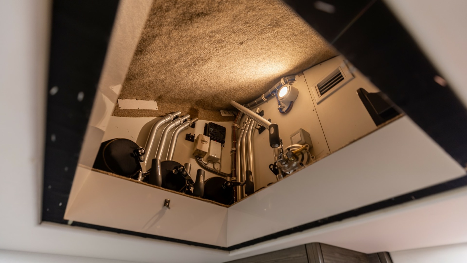 2021 65 Hatteras GT On the DL Port Aft SR Rod Storage (1)