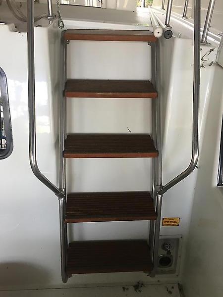 Tollycraft 39 sport ladder from aft deck to midbridge.JPG
