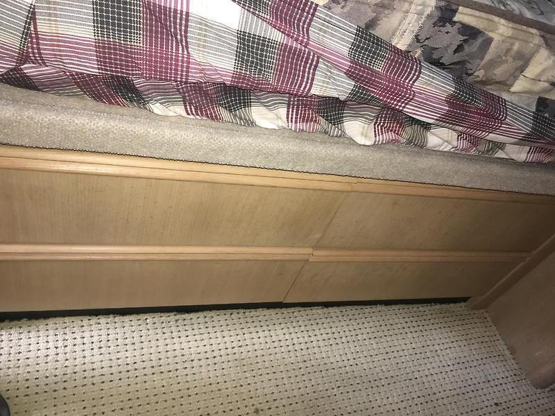 Tollycraft 39 sport under main cabin berth storage.JPG