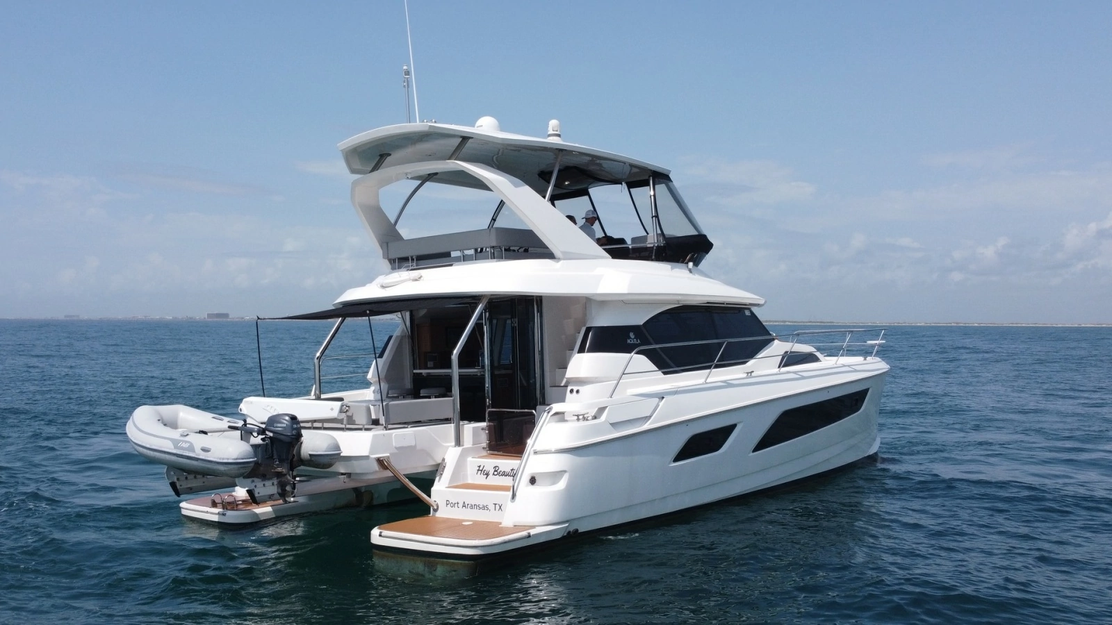 Aquila 44 CAT Aft View with Dinghy