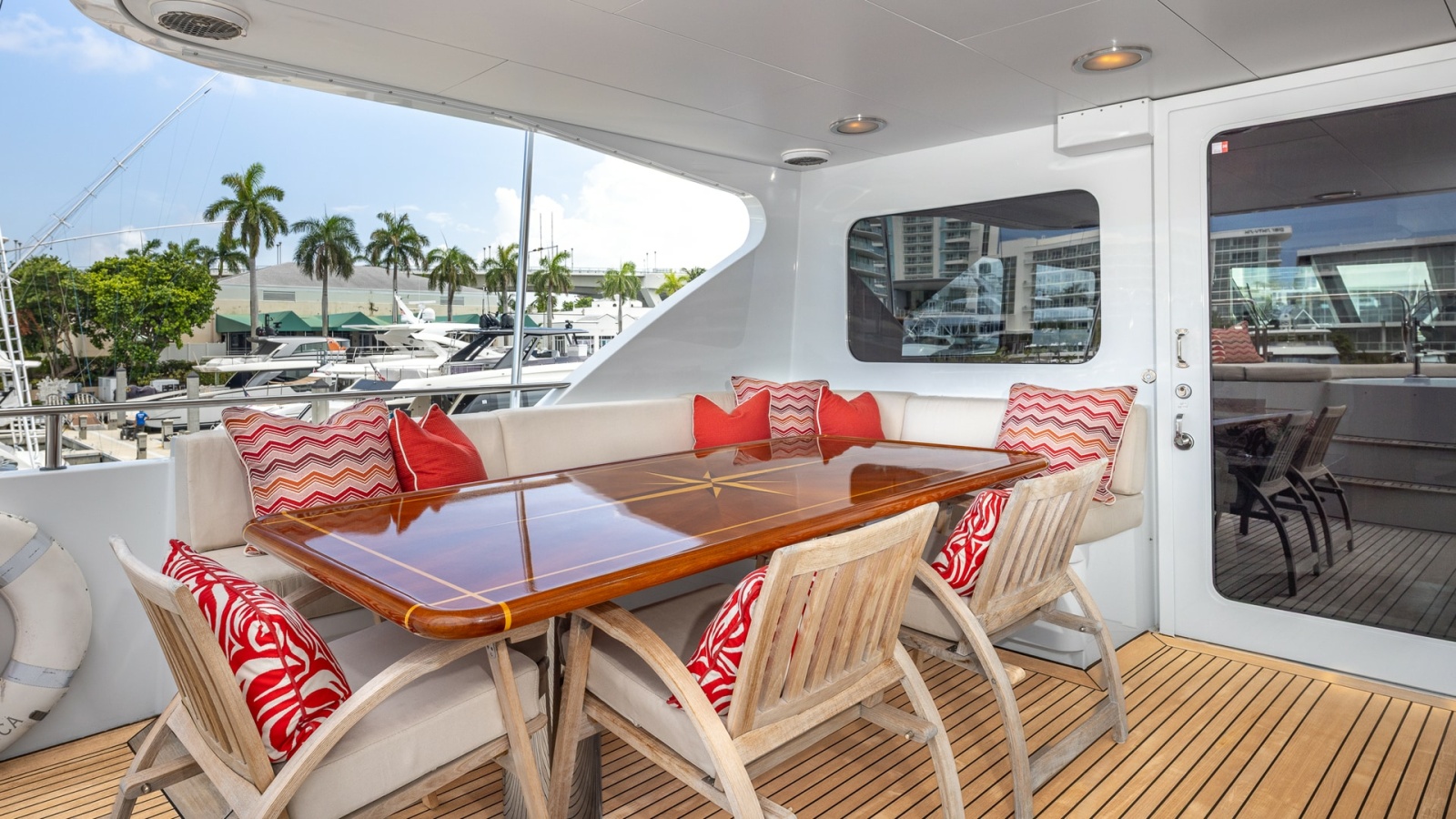 1998 Trinity Yachts Sport Fisherman - BAD COMPANY: Aft Deck with Dining Area
