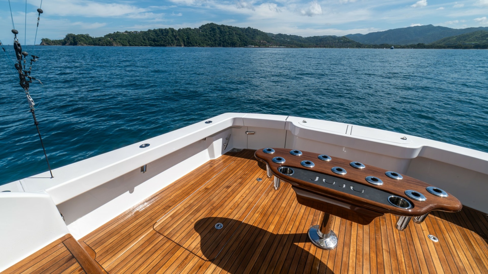 Spacious Teak Cockpit with Rod Holders